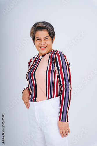 Cheerful happy old elderly senior woman isolate on white background.