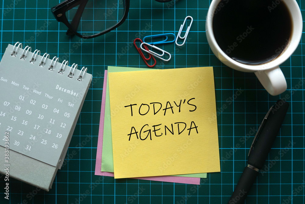 Top view of a calendar, glasses, paper clips, a cup of coffee and memo  notes written with Today's Agenda on green square background. Photos |  Adobe Stock