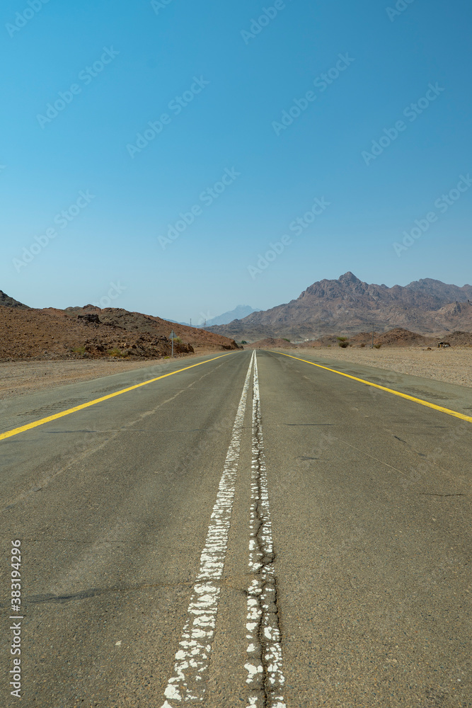 Desert road in remote rural area of Tabuk in north western Saudi Arabia