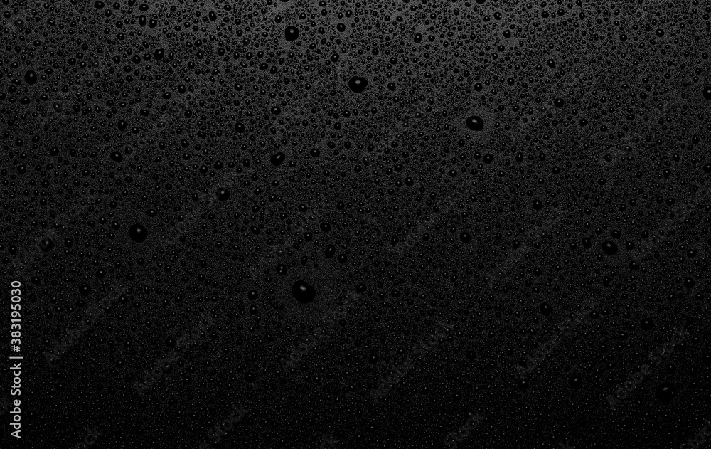 water droplets on black background water droplets on black background