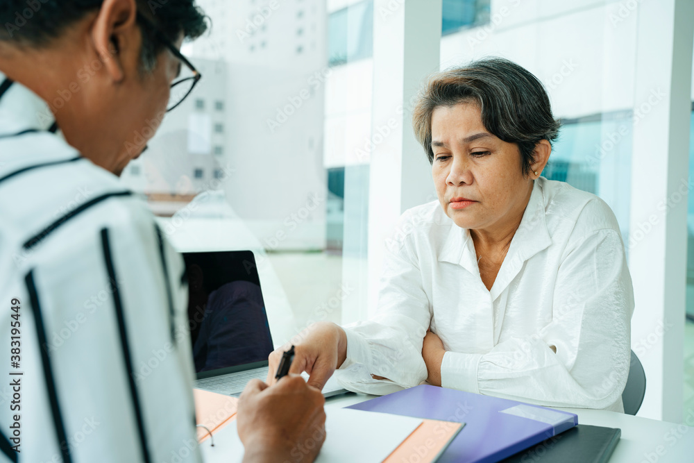 Adult business people working with partner together in office room. Adult business people working with partner together in office room.