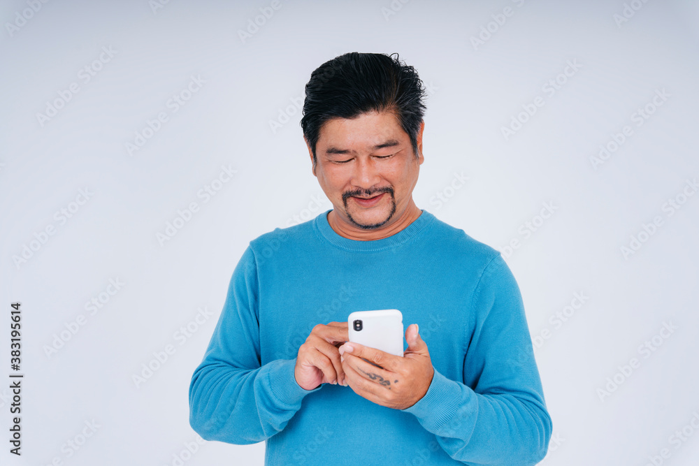 Excited senior man online shopping with smartphone. Excited senior man online shopping with smartphone.