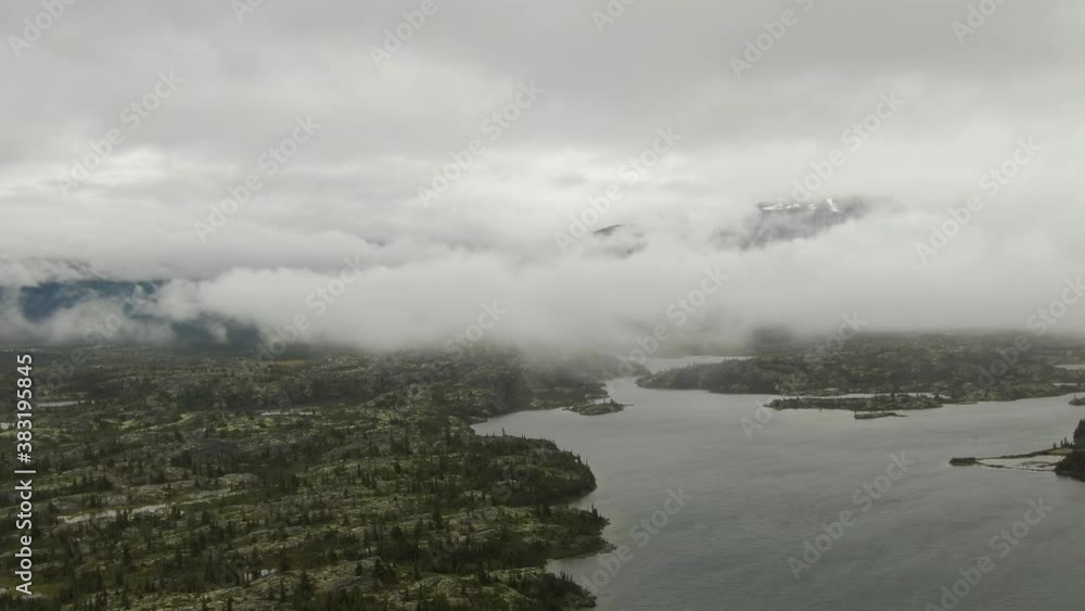 Beautiful View of Scenic Lake, Islands and Forest in Canadian Nature. Aerial Done Shot. Lewes Lake, South of Whitehorse, Yukon, Canada. 4K