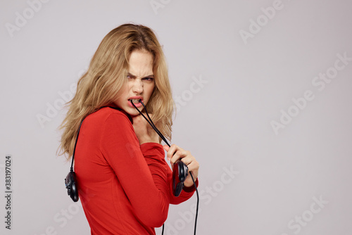 Pretty woman with gamepads playing entertainment leisure lifestyle light background
