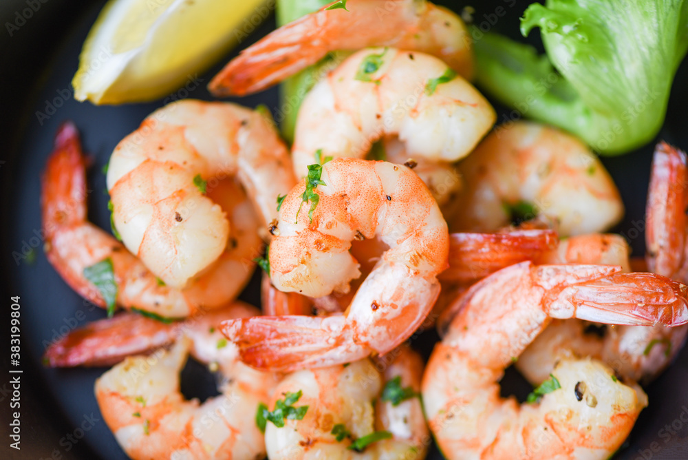 Salad shrimp grilled delicious seasoning spices on bowl appetizing cooked shrimps baked prawns Seafood shelfish with lemon and lettuce Salad shrimp grilled delicious seasoning spices on bowl appetizing cooked shrimps baked prawns Seafood shelfish with lemon and lettuce