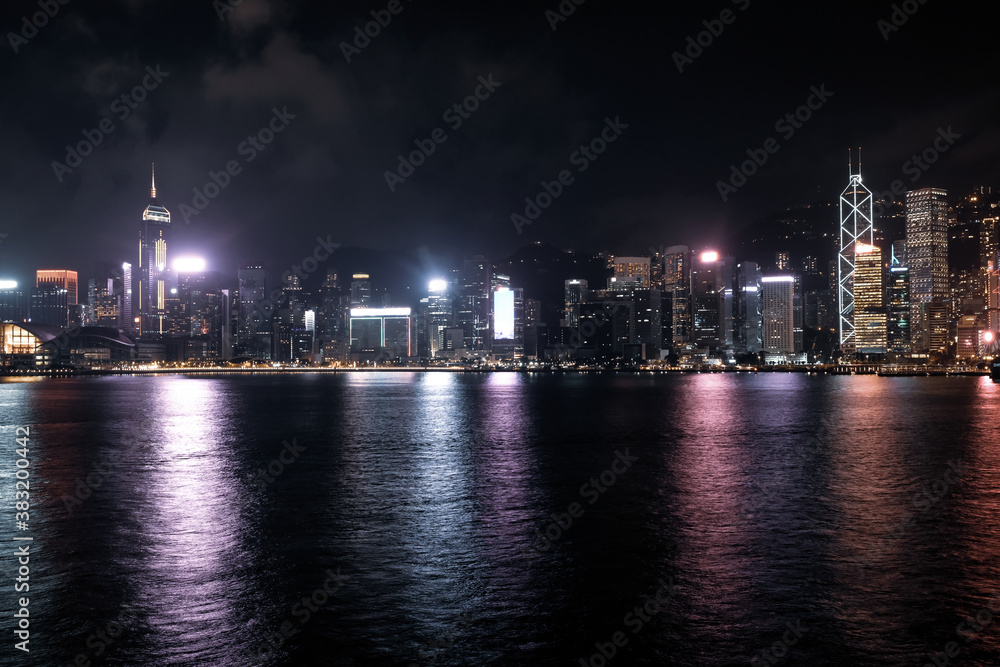 Hong Kong Skyline by night photography. This photo shows Hong Kong Island side in the early night time when all the lights are on.