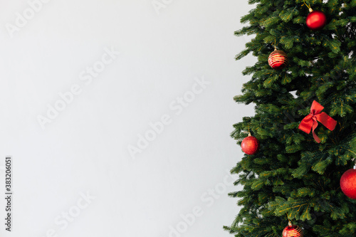 branches of the Christmas tree pine place for the inscription of the new year white background postcard