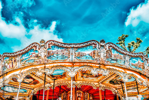 Entertainment Carousel for the youngest children. Horses on a carnival. © BRIAN_KINNEY
