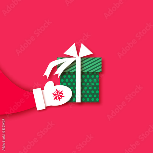 Merry Christmas Greetings Card with Santa Claus hands holding green giftbox with white bow. Happy New Year in papercraft style. Red. Winter holidays.