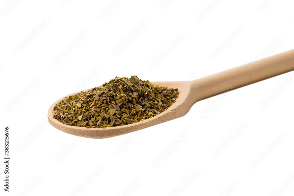 Oregano spice in wooden spoon isolated. Oregano spice in wooden spoon isolated.