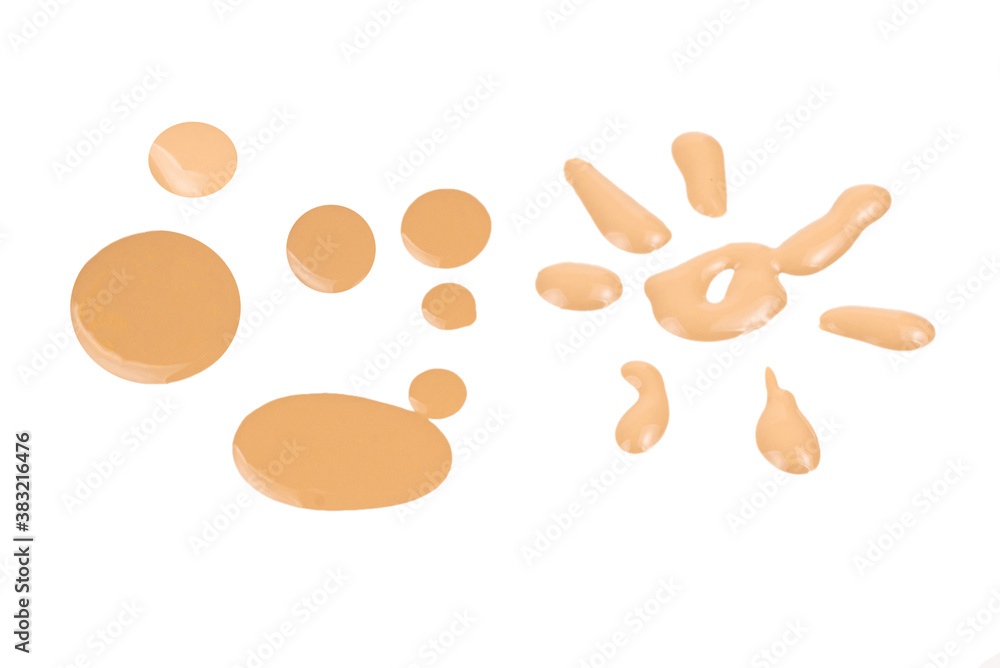 Liquid foundation swatch isolated on white background. Close Up of makeup cream sample. Liquid foundation swatch isolated on white background. Close Up of makeup cream sample.