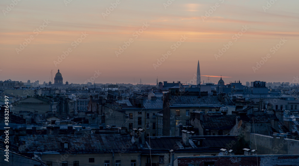 Saint-Petersburg, Russia. View above of night cityscape. Dome of Saint Isaac's Cathedral  and lakhta center at sunset.