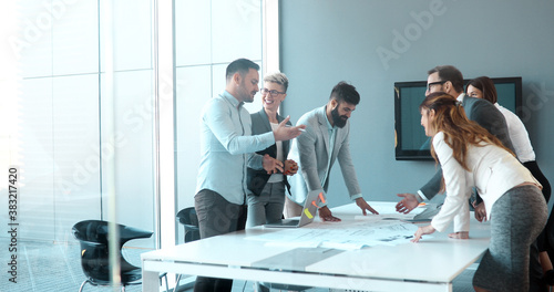 Fotografie Perspective businesspeople having meeting in conference room
