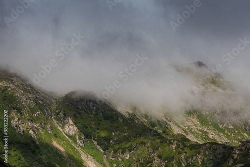 dense white fog in the mountains while hiking