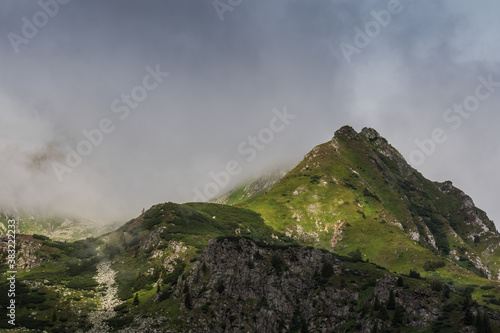 dense rainclouds over a rocky mountain