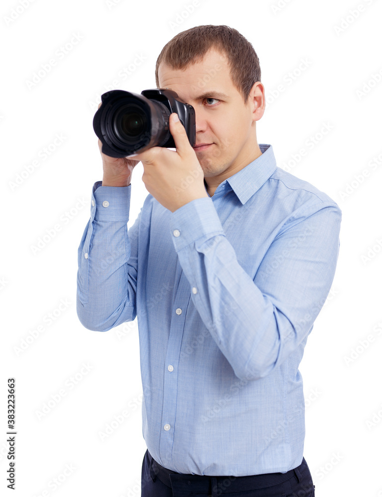 Obraz premium portrait of male photographer taking photo with modern dslr camera isolated on white