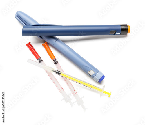 Syringes for insulin injection on white background