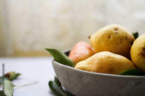 Wallpaper Mural A bowl of fresh pears served on the table. Closeup view.  Torontodigital.ca