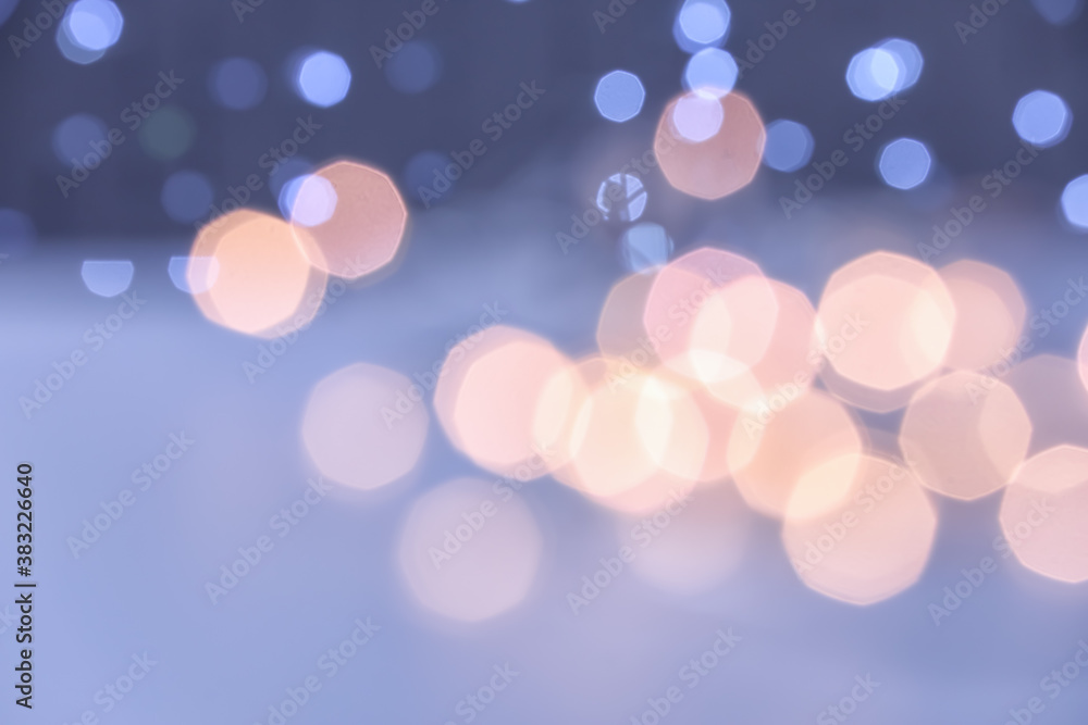 Blurred Christmas lights on grey background Blurred Christmas lights on grey background