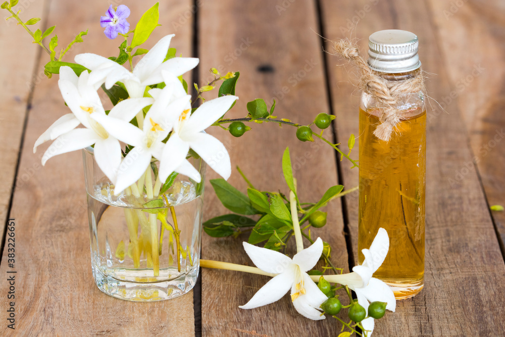 herbal essential oils aromatherapy extract flowers cock tree local flora of asia of lifestyle relaxation decoration on background wooden herbal essential oils aromatherapy extract flowers cock tree local flora of asia of lifestyle relaxation decoration on background wooden
