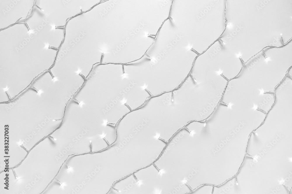 Obraz premium Christmas lights on white background