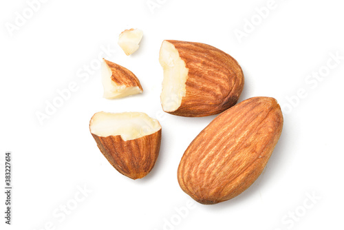 Flat lay (top view) of Close-up Almond seeds  with cracked isolated on white background.