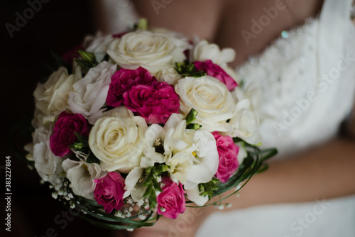 bride holding bouquet, the bride's bouquet, bridal bouquet of pink roses, wedding day