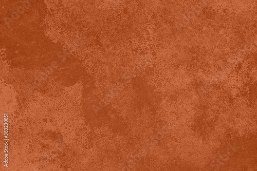 Saturated dark orange brown colored low contrast Concrete textured background with roughness and irregularities. 2021, 2022 color trend.