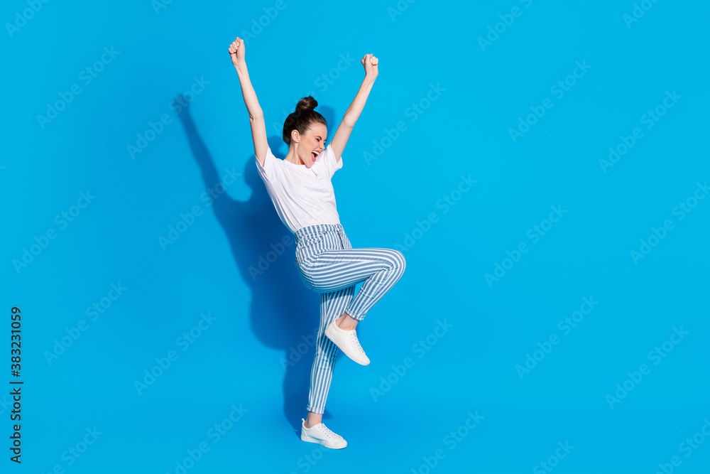 Full length body size view of nice attractive pretty delighted excited cheerful cheery teen girl rejoicing having fun holiday vacation isolated on bright vivid sine vibrant blue color background Full length body size view of nice attractive pretty delighted excited cheerful cheery teen girl rejoicing having fun holiday vacation isolated on bright vivid sine vibrant blue color background
