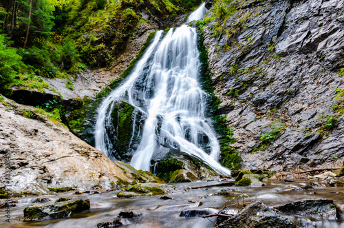 View of Bride's Veil / Valul Miresei Waterfall in Apuseni Natural Park, Cluj County, Transylvania, Romania, Europe. photo