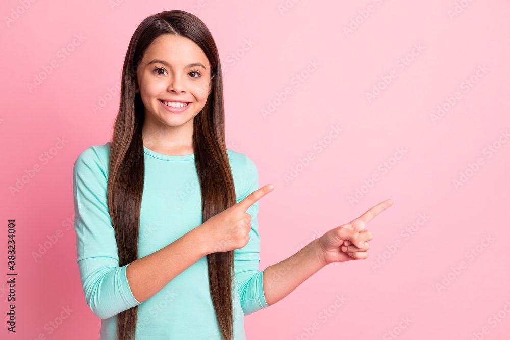 Photo of lovely sweet little latin lady long hairdo direct indicate forefinger demonstrate offer empty space shiny beaming smile wear turquoise sweatshirt isolated pink color background Photo of lovely sweet little latin lady long hairdo direct indicate forefinger demonstrate offer empty space shiny beaming smile wear turquoise sweatshirt isolated pink color background