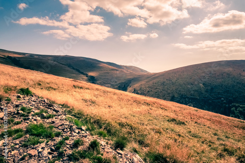 Scenic sunset landscape in the Vulcan Mountain Pass, Romania, Europe.