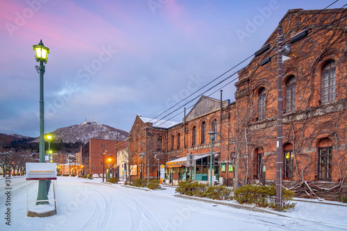 Cityscape of the historic red brick warehouses  at twilight in Hakodate Hokkaido Japan in winter photo