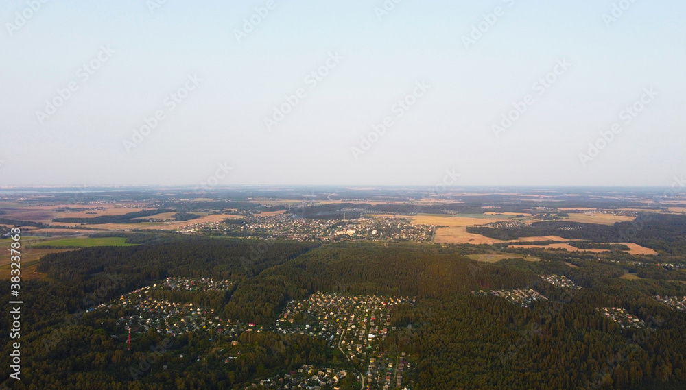 Beautiful top view of a forest landscape with green trees near the suburb Beautiful top view of a forest landscape with green trees near the suburb