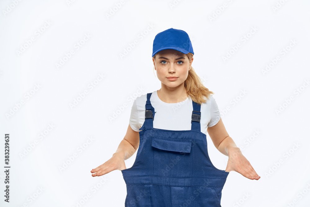 Woman in working uniform blue cap delivery courier delivery service Woman in working uniform blue cap delivery courier delivery service