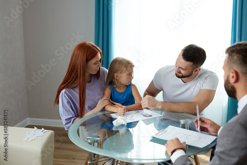 professional psychologist support young married family with daughter, they discuss problems, save family, talk about possible guardianship