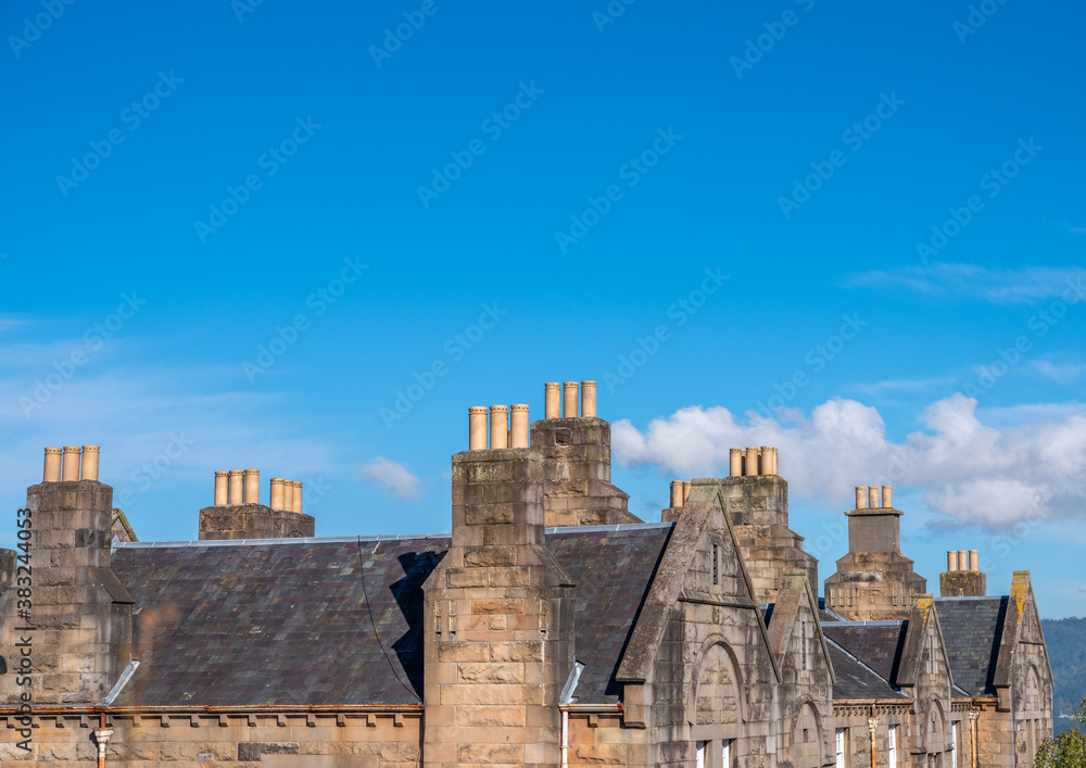 Rows of chimneys on slate roof