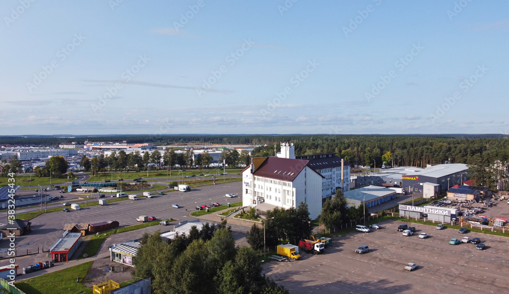 Top view of a business center with parking. 01 October 2020, Minsk Belarus Top view of a business center with parking. 01 October 2020, Minsk Belarus