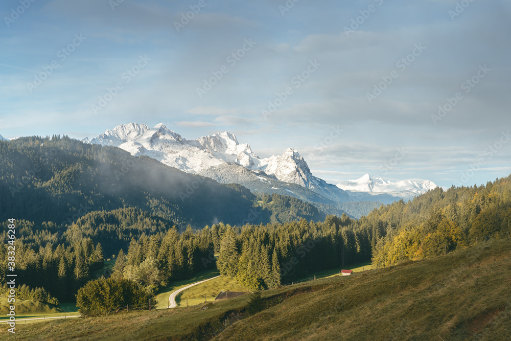 Scenic view of Alpspitze Mountain and Zugspitze Mountain during sunrise Scenic view of Alpspitze Mountain and Zugspitze Mountain during sunrise