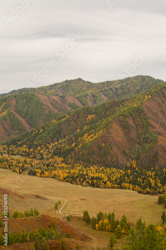 Autumn mountain landscape. Autumn in the mountains of Gorny Altai. Travel to Altai.