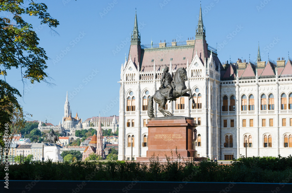 Hungarian Parliament Building with Matthias church in the background Hungarian Parliament Building with Matthias church in the background