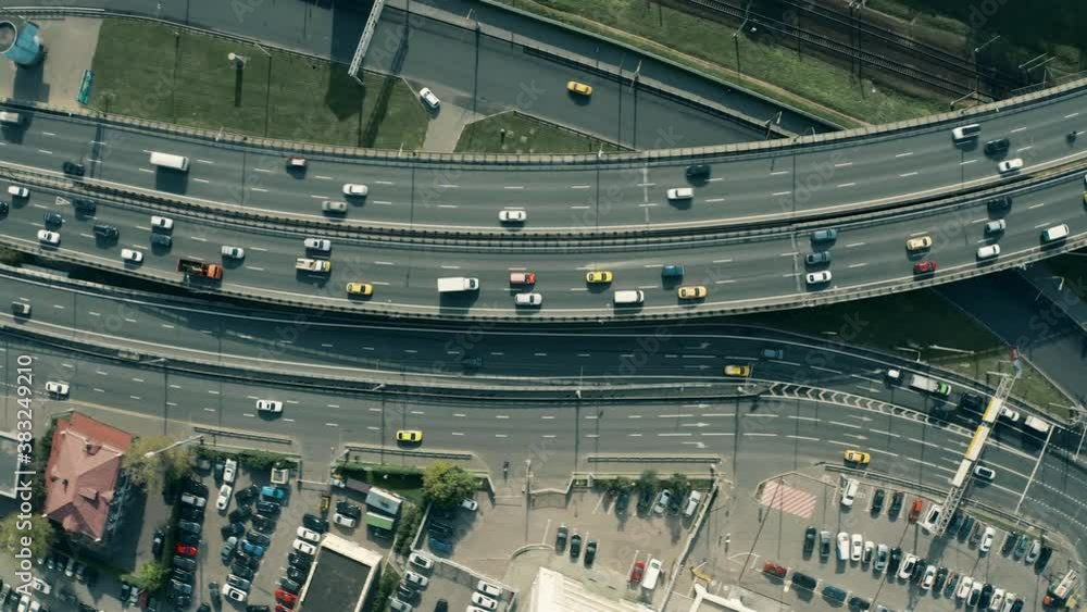 Aerial overhead shot of slow road traffic on a highway curve Aerial overhead shot of slow road traffic on a highway curve