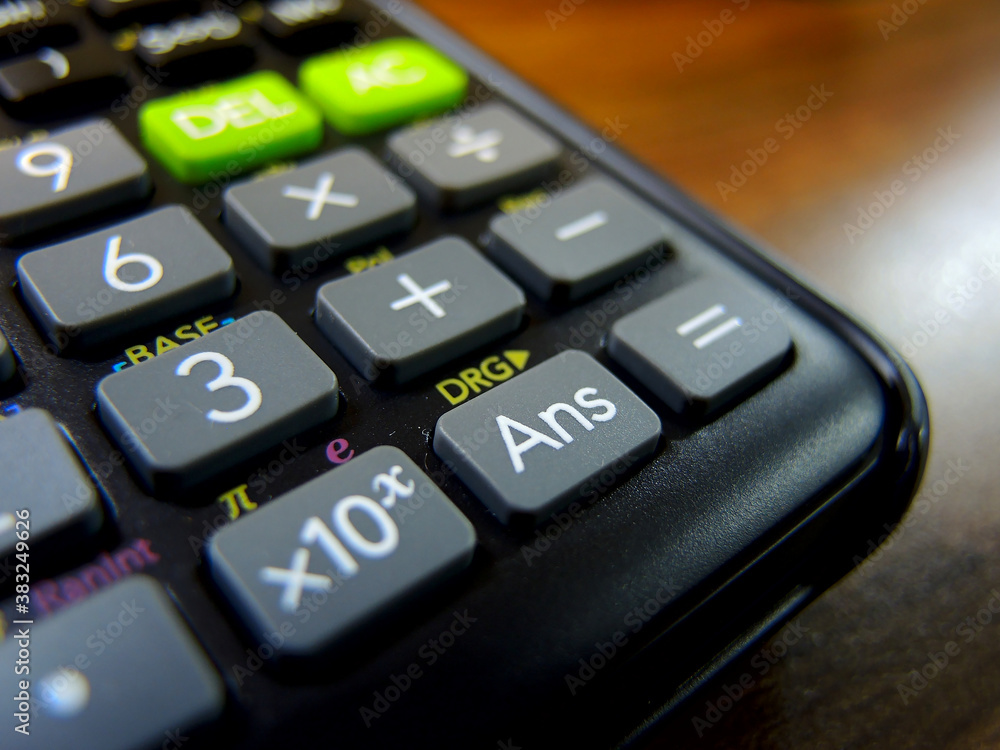Detail of generic black scientific calculator Detail of generic black scientific calculator
