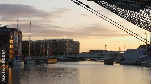 Footbridge on Olowianka in Gdansk at sunrise.
 photo