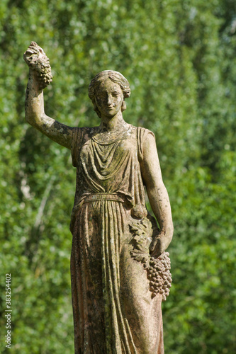 statue of goddess vine in a garden
