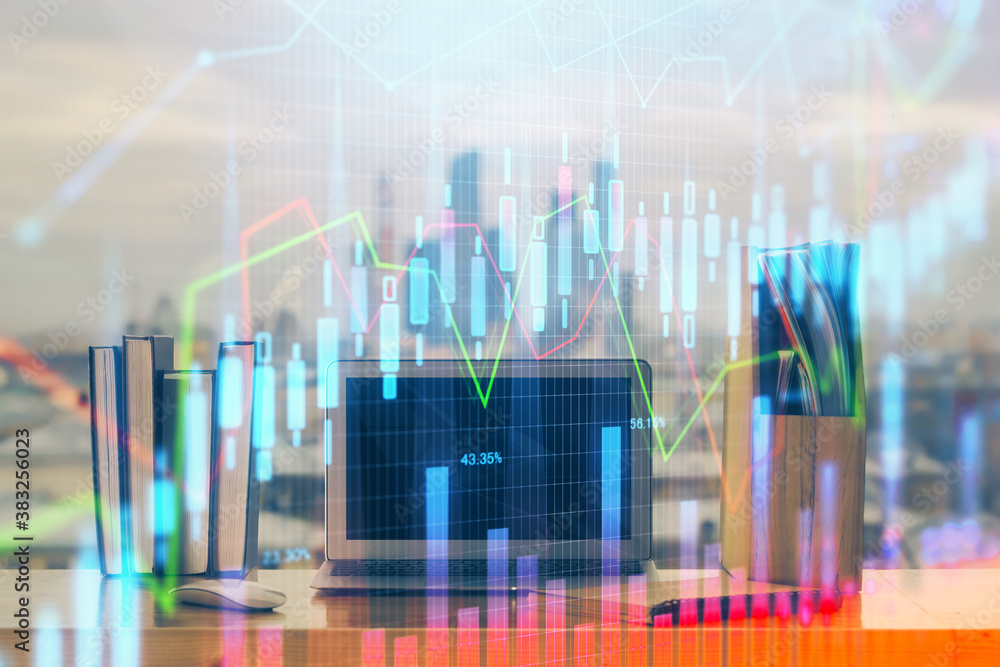 Forex market chart hologram and personal computer background. Double exposure. Concept of investment. Forex market chart hologram and personal computer background. Double exposure. Concept of investment.