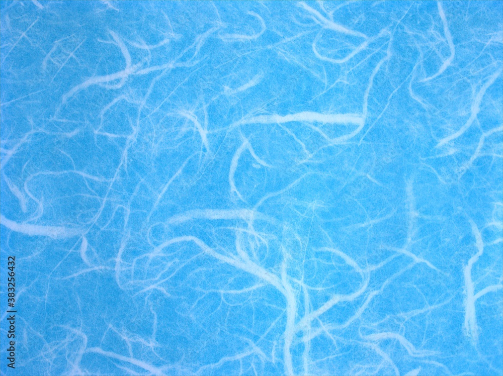Obraz premium Abstract blue mulberry paper texture or background ,colored paper for wallpaper ,blue water background