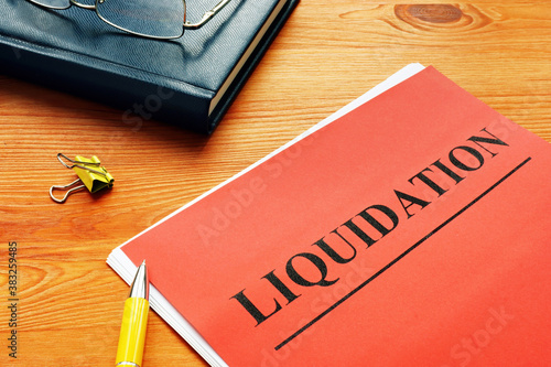 The word liquidation is printed on the red page. photo