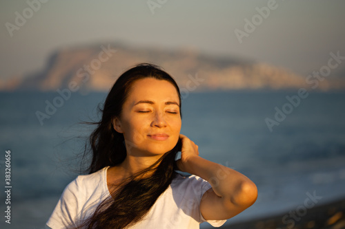Authentic potrait of a female with long black hair