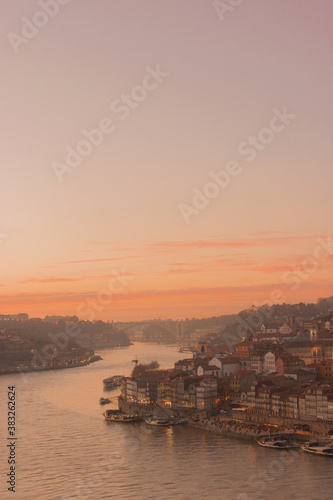 Sunset in the city of Oporto with river